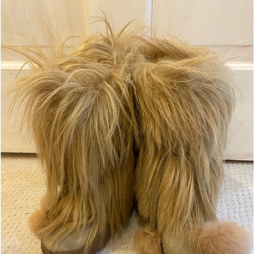 Women’s size 4 or children’s size 3 furry boots made in Italy. $75